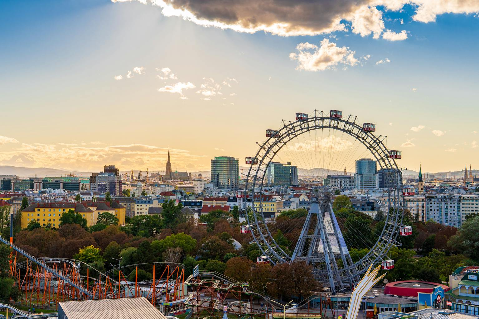 White Ferris Wheel Near City Buildings